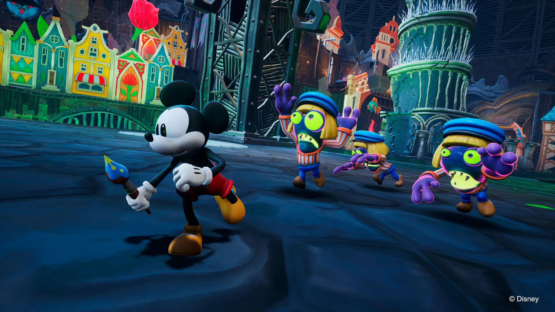 Mickey Mouse, con su pincel en la mano, avanza hacia tres criaturas de colores en una calle de casas pintadas
